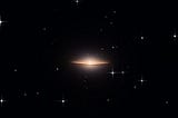 A Galaxy on the Edge: M104