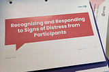 Image of a folder set on a table, with a page displaying the following text against a red background: “Recognizing and Responding to Signs of Distress from Participants”