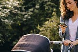 Woman Checking Messages On Her Smart Phone While Pushing An Infant Stroller by Jacob Lund Photography from NounProject.com