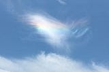 Brilliant rainbow in a cloud