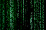 Vertical rows of digital code streaming in green down a black background to represent AI algorithms