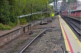 A dirty, broken old railway platform