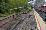 A dirty, broken old railway platform