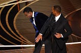 Will Smith slaps Chris Rock on stage during the 94th Oscars at the Dolby Theatre in Hollywood, California, on March 27, 2022.