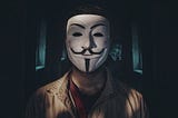 Anonymous person with Guy Fawkes mask