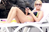 Carrie Underwood Makes A Splash In A Colourful Tiny Bikini