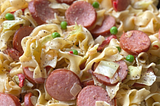 SAUSAGE AND CABBAGE WITH NOODLES