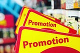 Signs in a retail store saying “Promotion”