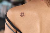Bold Tiny Sun Tattoo Designs on Back
