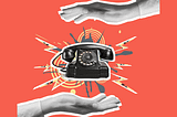 two hands hovering over an old fashioned black telephone