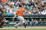 Houston Astros' Preston Tucker hits a home run during the ninth inning of a baseball game against the Detroit Tigers, Thursday, May 21, 2015, in Detroit. (AP Photo/Carlos Osorio)