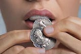 Myth: Holding a Silver Dollar Under Your Tongue Can Prevent Hangovers