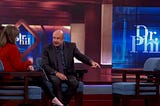 Why is Dr. Phil pointing at an Empty Chair?