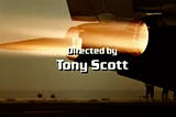 Screen shot off of opening titles for Top Gun, jet engines ablaze under director’s credit.