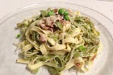 Wolfgang Puck’s Straw and Hay Pasta with Prosciutto and Peas