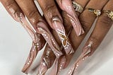 Super Long artificial fingernails trend in Nigeria — 2Dots Market Blog -