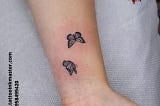 The Tiny Roving Butterflies Tattoo