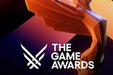 The game awards statue with the logo in front of it.