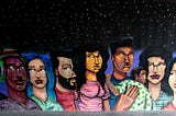 a mural depicting people gathered in a dimly lit room, showcasing unity and diversity