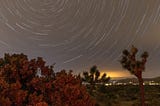 Night photography recipes - Star Trails Overlooking Yucca Valley in Black Rock Campground