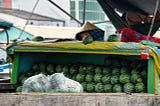 Different life’s aspects on the tourist floating market of Can Tho, Vietnam