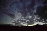 Photo of dark clouds at sunset