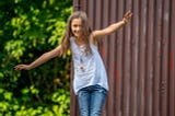 A little girl plays