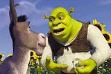 Still shot from the movie, Shrek, with Shrek explaining that ogres are like onions to Donkey