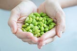 Woman holding soybeans