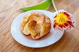 a Yorkshire pudding served as a starter on a plate