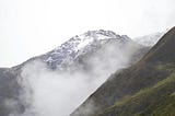 Photo of mountains with cloud obscuring the distance