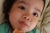 My daughter eating a pancake