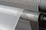 The PVC Coating Process: Creating High-Performance Mesh Fabrics