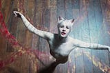 white cat dancing, arms outstretched