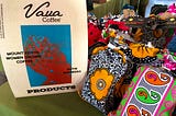 Colorful Bags of Vava Women Coffee on a booth