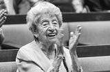 Lovely old lady smiling and applauding