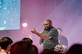 A preacher preaching to a congregation
