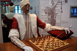 Photograph of a mechanical turk or an automaton chess player in Heinz Nixdorf MuseumsForum, Paderborn, Germany.