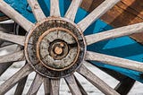 A close-up photo of a wheel with spokes