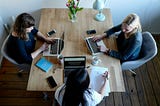 Colleagues working together at a table