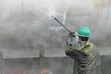 The Power of Industrial Power Washing: Transforming Surfaces with Precision and Efficiency