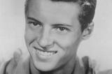 Black and white photo of TV’s Eddie Haskell, played by Ken Osmond