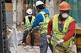 Construction workers working in their Safety Wears