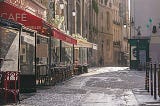 An image of a Parisian street and cafe