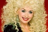 Dolly Parton, sporting very big hair circa 1980s.