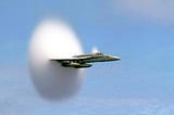 A picture of an aircraft breaking the sound barrier