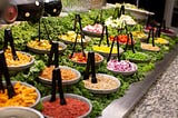 image showing a salad bar at a buffet.