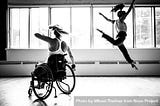 np_MONTREAL, QUEBEC, CANADA – August 29 2018- One woman in a wheelchair, another woman leaping_0WnM6b_free.jpg