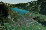 A 3d map of Interlaken, Switzerland. The town sits in a valley, alongside a blue lake