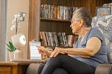 An elderly women tests a robot companion in New York, June 7, 2022. Photo by ElliQ/Cover Images via Reuters Connect